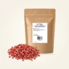 Roze Peperkorrels — navulzak 100 g, met kruiden op de voorgrond