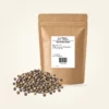 Tellicherry Peper — navulzak 100 g, met kruiden op de voorgrond