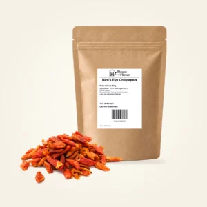 Bird's Eye Chilipepers — navulzak 50 g, met kruiden op de voorgrond
