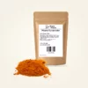 Pikante Currykruiden — navulzak 100 g, met kruiden op de voorgrond